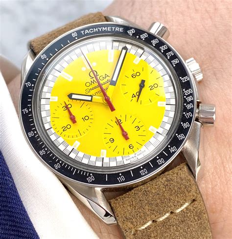 omega speedmaster michael schumacher yellow